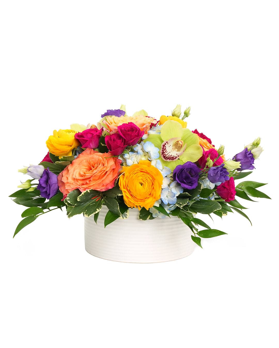 Vibrant floral arrangement featuring roses, orchids, and seasonal blooms in a stylish white vase.