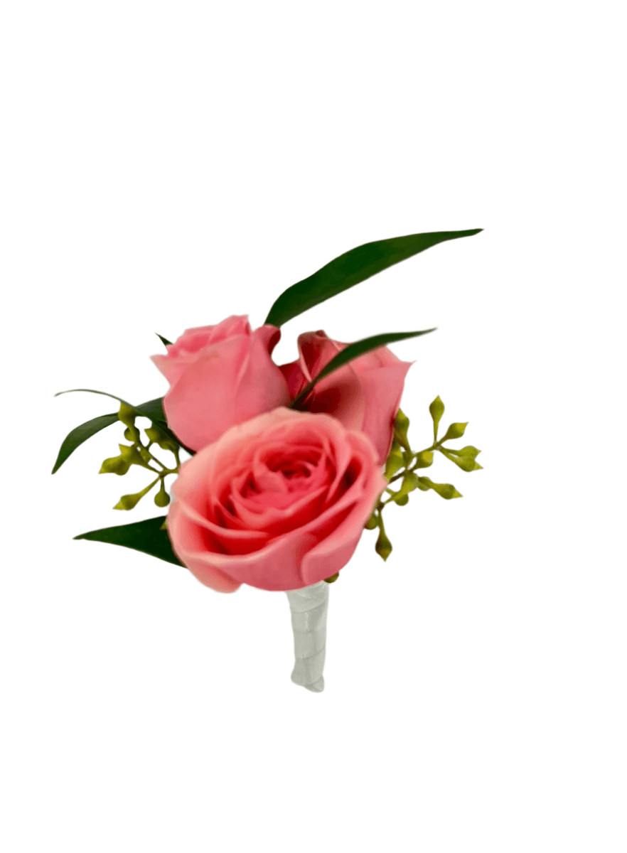 Beautiful pink rose boutonnière with delicate greenery, perfect for weddings or special occasions.
