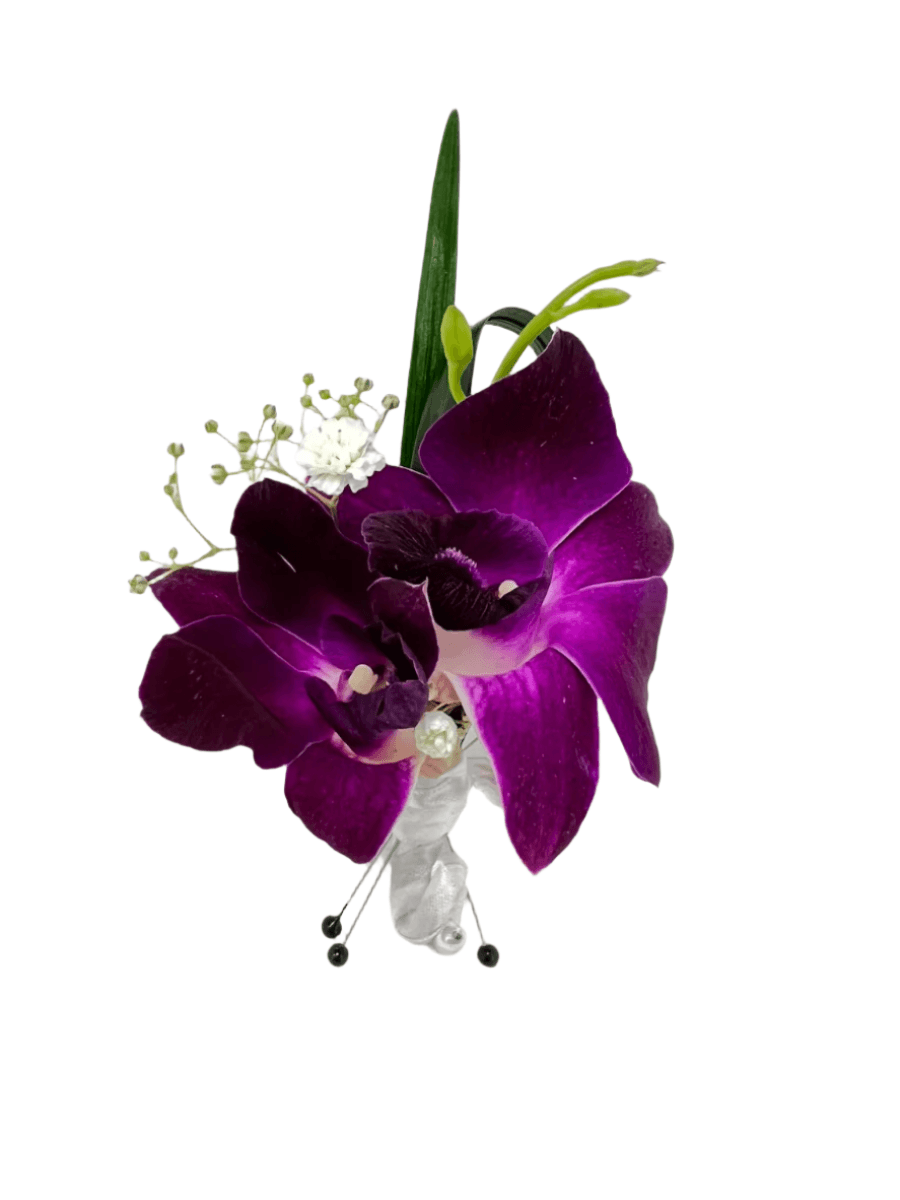 Elegant purple orchid boutonniere with delicate accents and greenery, perfect for special occasions.