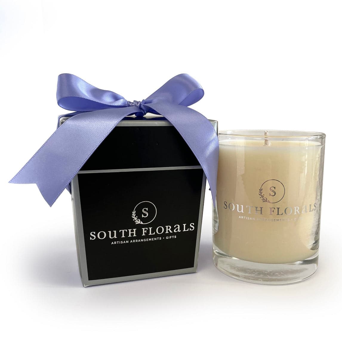 Elegant South Florals candle gift set in a chic black box with a lavender ribbon for a perfect home fragrance experience.