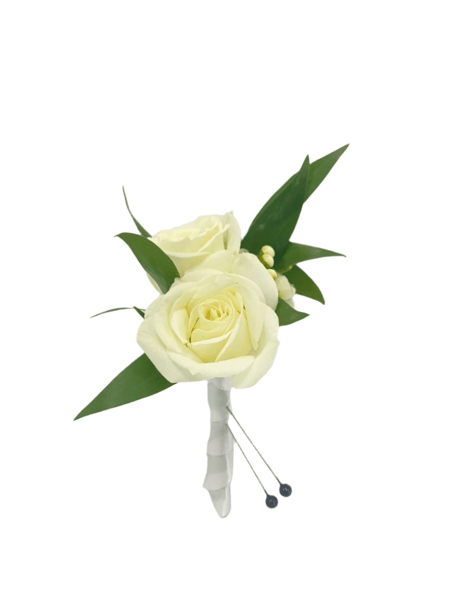 Elegant white rose boutonniere with greenery, perfect for weddings and formal events.